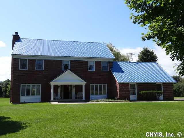 Exterior Front Handsome brick front w/vinyl trims 