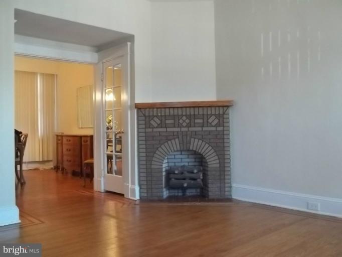 830 Whitmore Ave, Baltimore, MD 21216 - photo 1