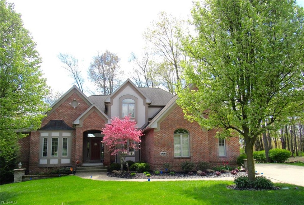 Welcome to 768 Yorkshire Ct. Copley Oh. This custo