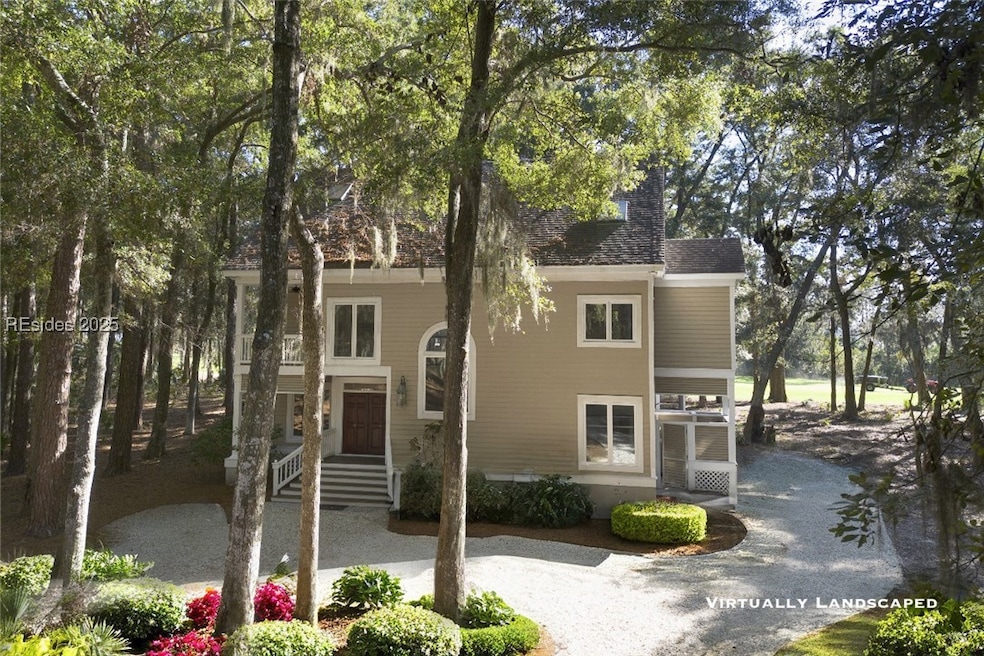 Front of home with virtially staged landscaping