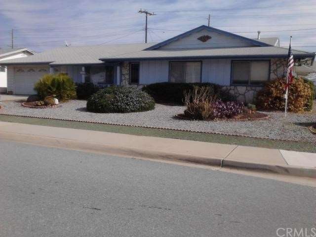 Corner lot fenced backyard