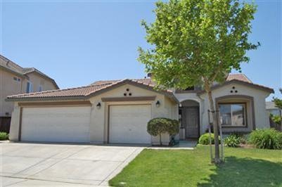 Raised elevation in front yard. Covered courtyard 