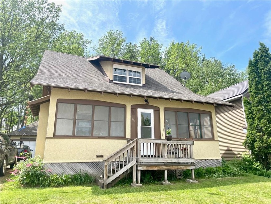 Adorable (3) Bedroom, (2) Bathroom Glenwood home that offers hardwood floors, large front porch, private backyard, updated kitchen, 2019 water heater, 2015 shingles on both home and garage, and more! Large master bedroom w/double closet, newer concrete floor in garage, unfinished basement for lots of storage, circuit breakers for electrical and loads of character! Nice property!