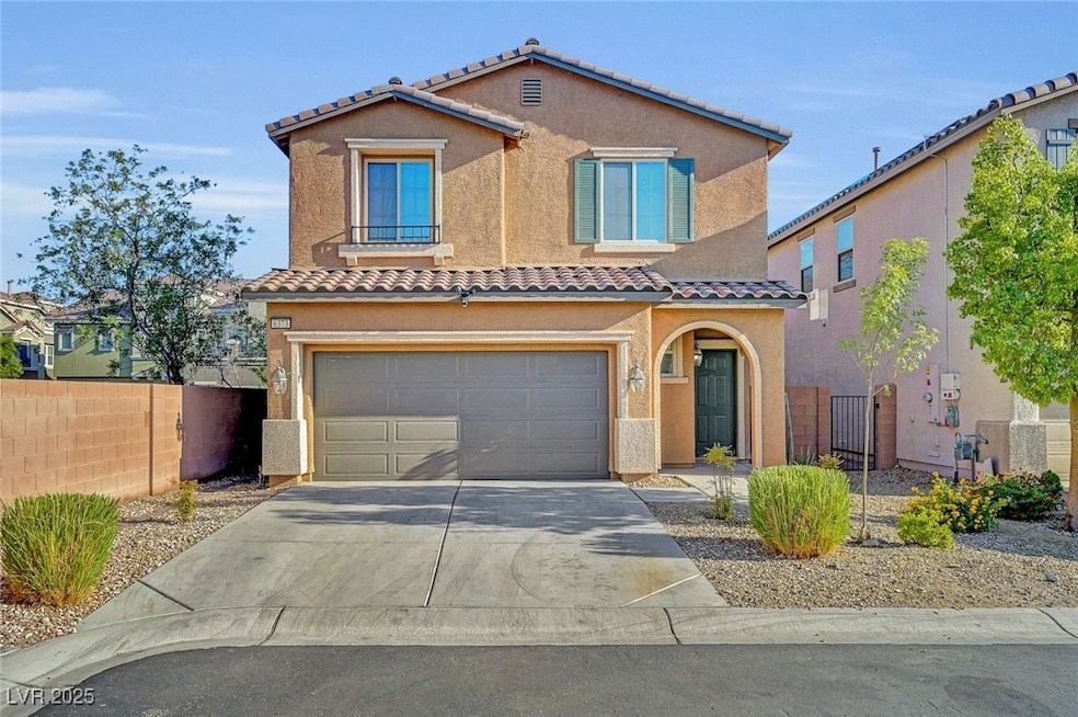 Mediterranean / spanish-style home featuring a til