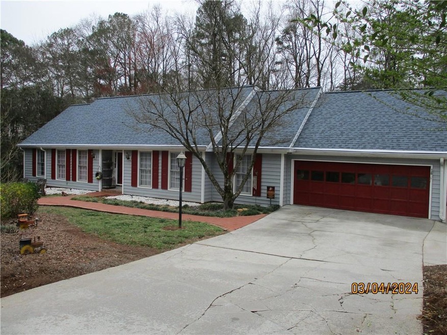 Ranch-style home with a garage