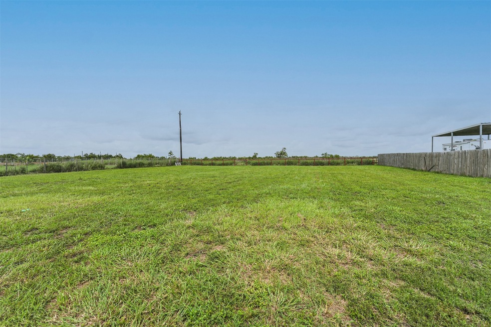 Backyard ** Picture is from Neighbors property but same same sqft lot