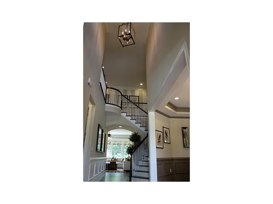 Foyer. Pictures are of decorated model.  Upgrades 