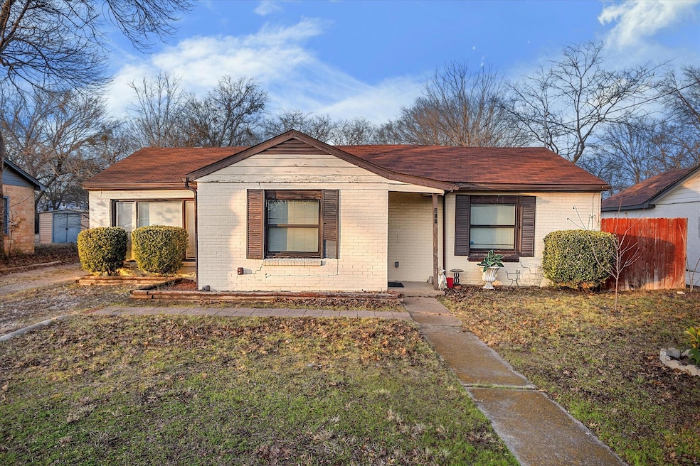 Bungalow-style house featuring a front yard