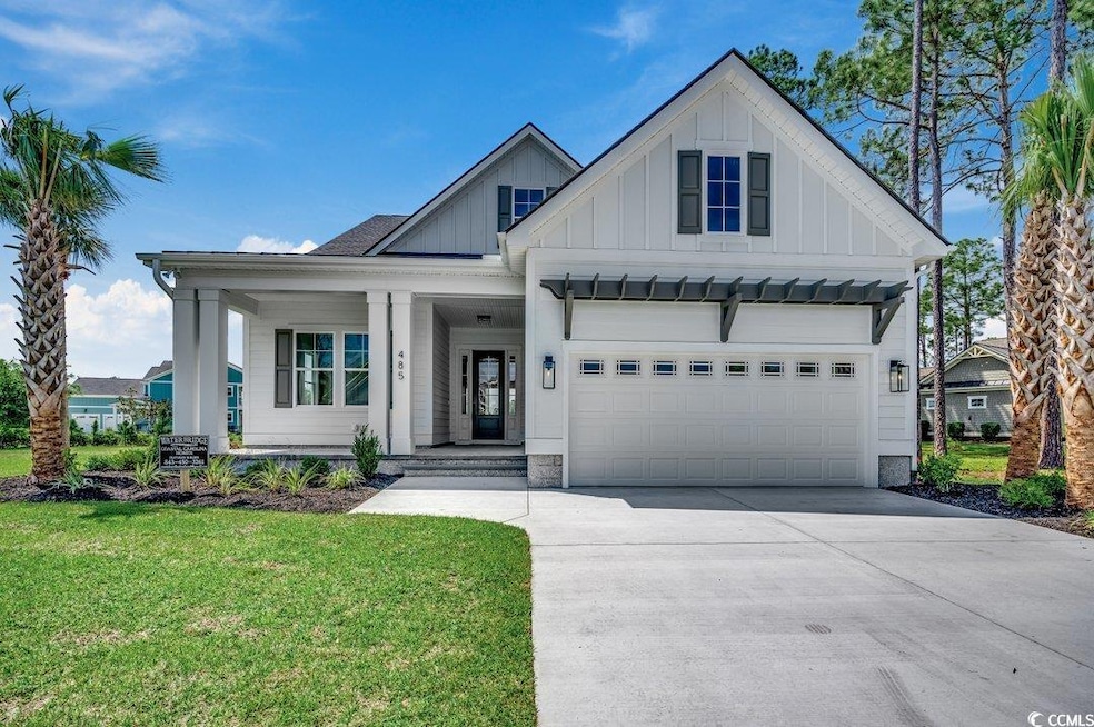 Modern inspired farmhouse with board and batten si