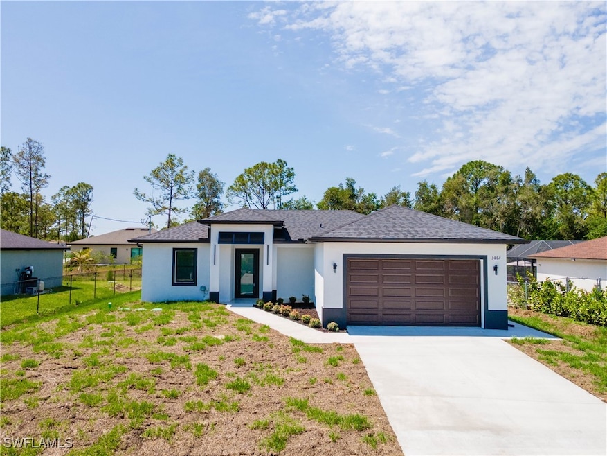 View of front of property with an attached garage,