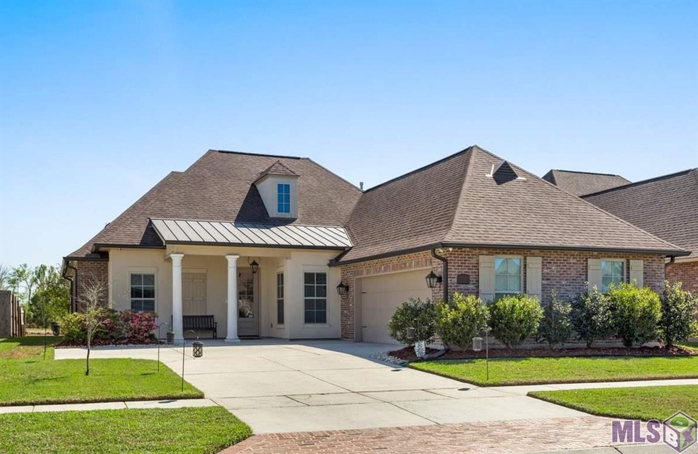 Front Porch ~ Double Attached Garage ~ Gutters (fr