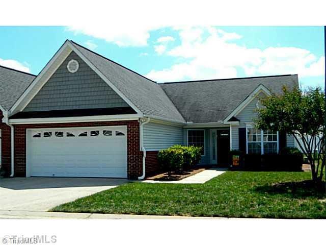 Exterior Front. Beautiful townhouse with 2 car garage and extra parking next to home.  HOA includes exterior maintenance and landscaping.