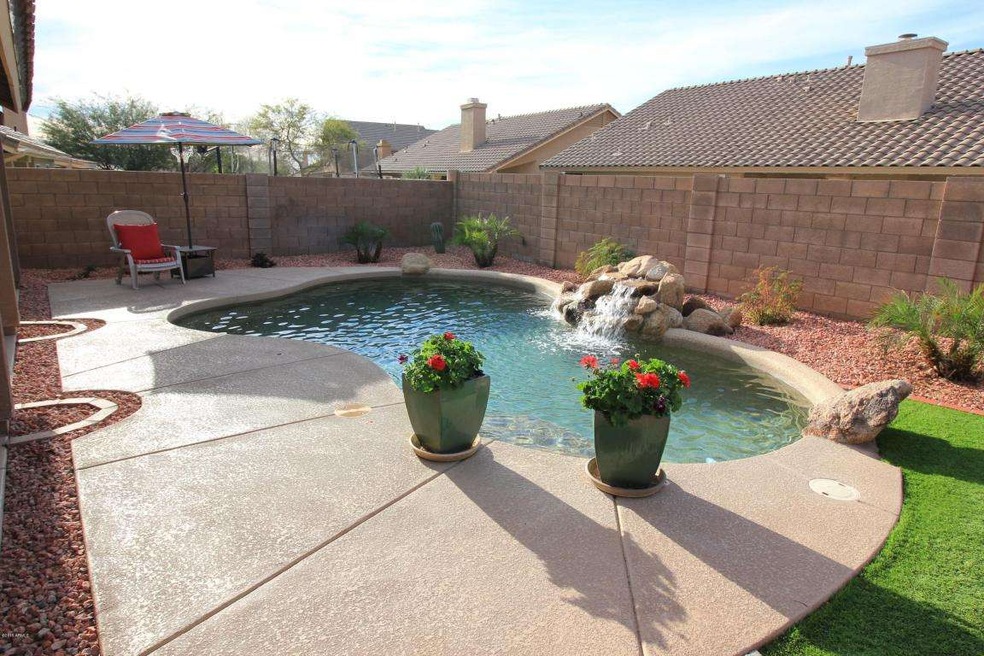 BACKYARD PEBBLE-TEC POOL W/WATERFALL