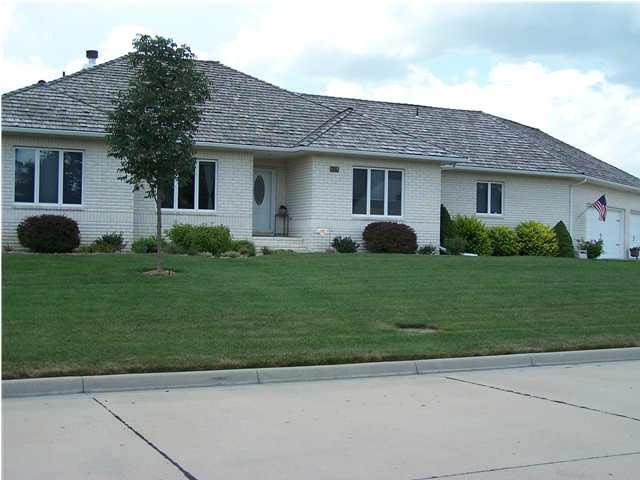 This corner lot welcomes you to this beautiful hom