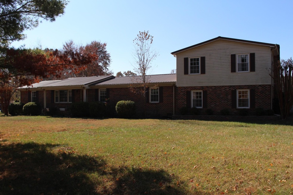 Don't miss this Deal! 413 Ridgewood Dr .  Over 3300sq/ft, 1.8 acre lot, Detached Workshop/Garage, Inground Pool w/ Pool House, 5 Bedrooms, Living Room - Den - Rec Room .  PRICED TO SELL!