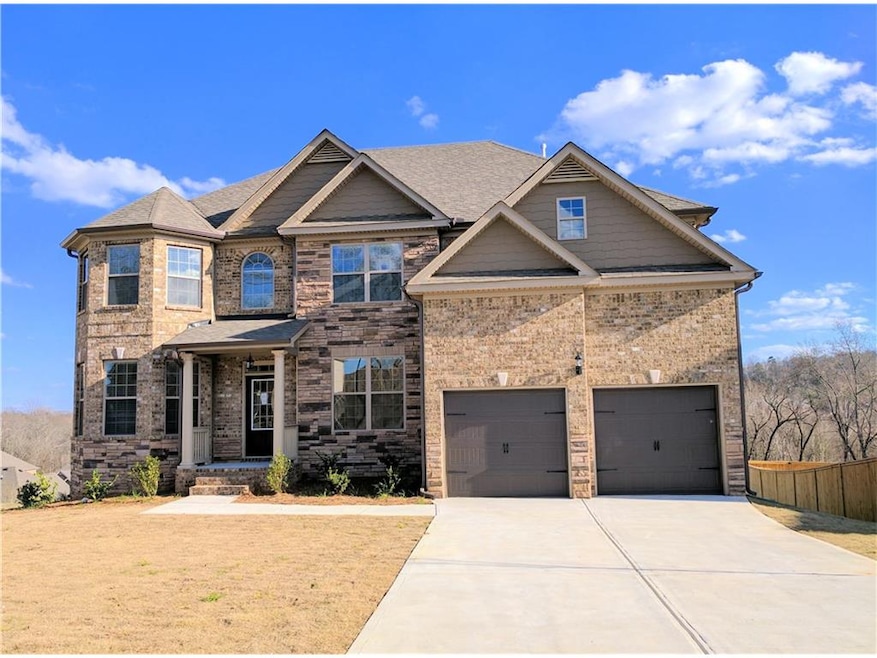 Full brick front with a turret in front that gives
