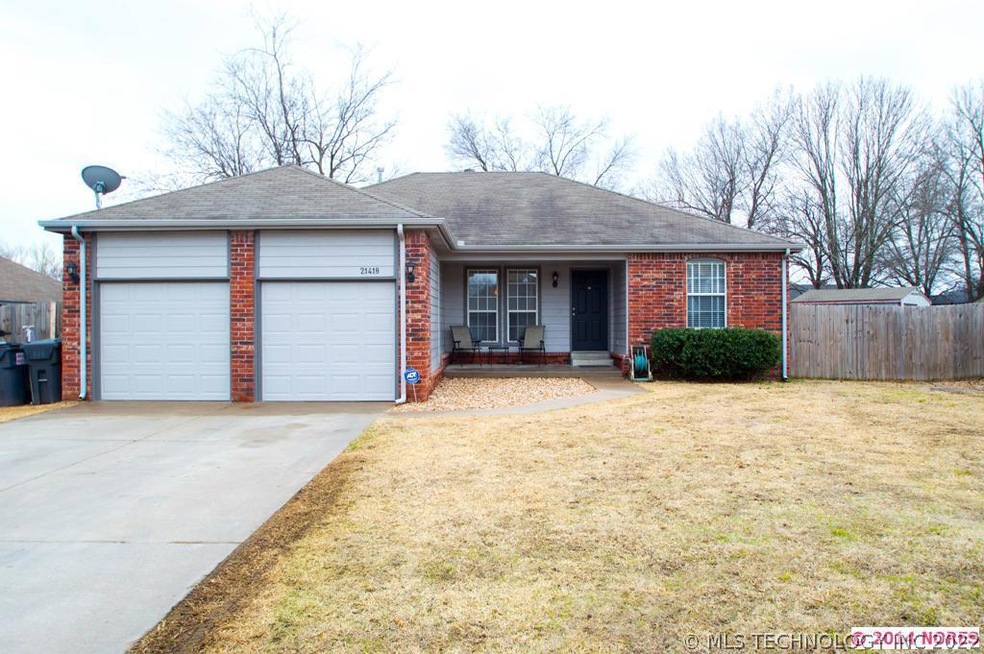 New exterior paint and new garage doors adds to th