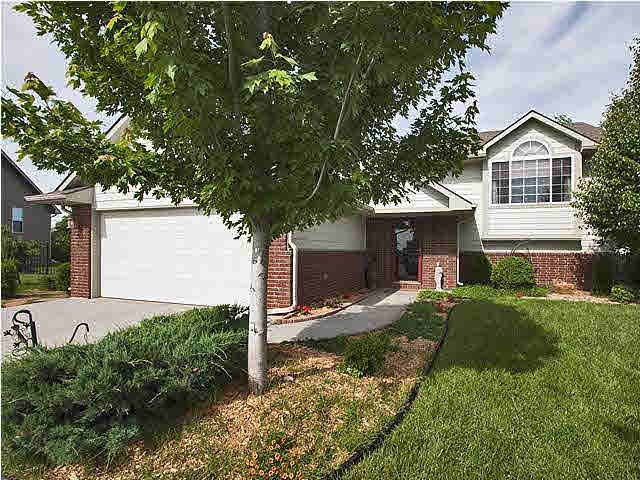 Beautifully landscaped with wonderful curb appeal!