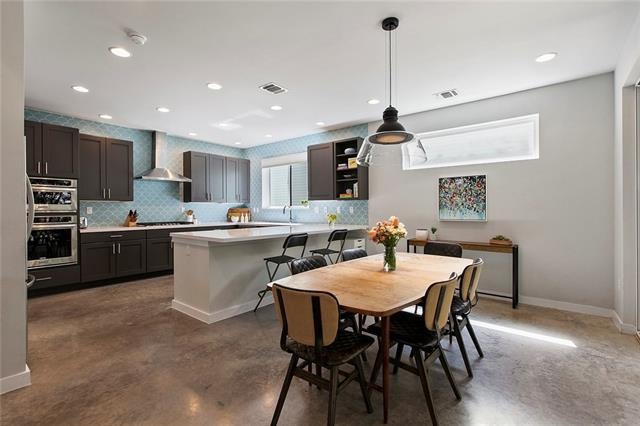 Open floorplan flooded with natural light.
