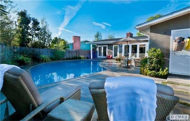 Back of house faces south to sun drenched yard