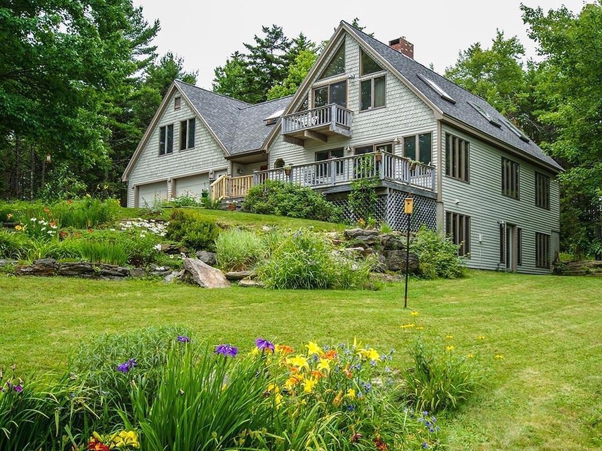Nicely landscaped and sited custom...