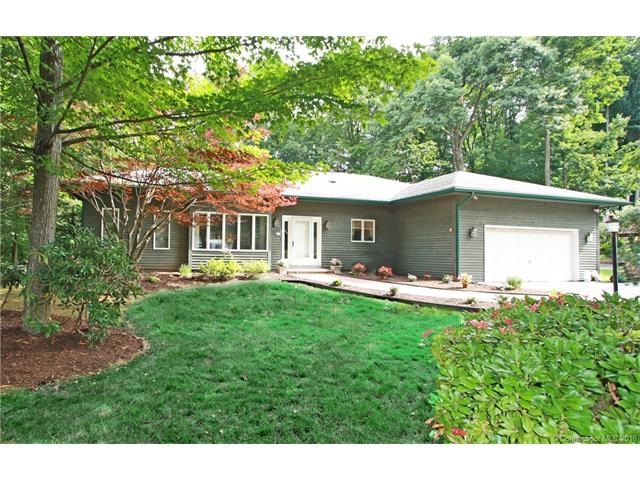 Not your typical ranch style home! Sits on a beaut