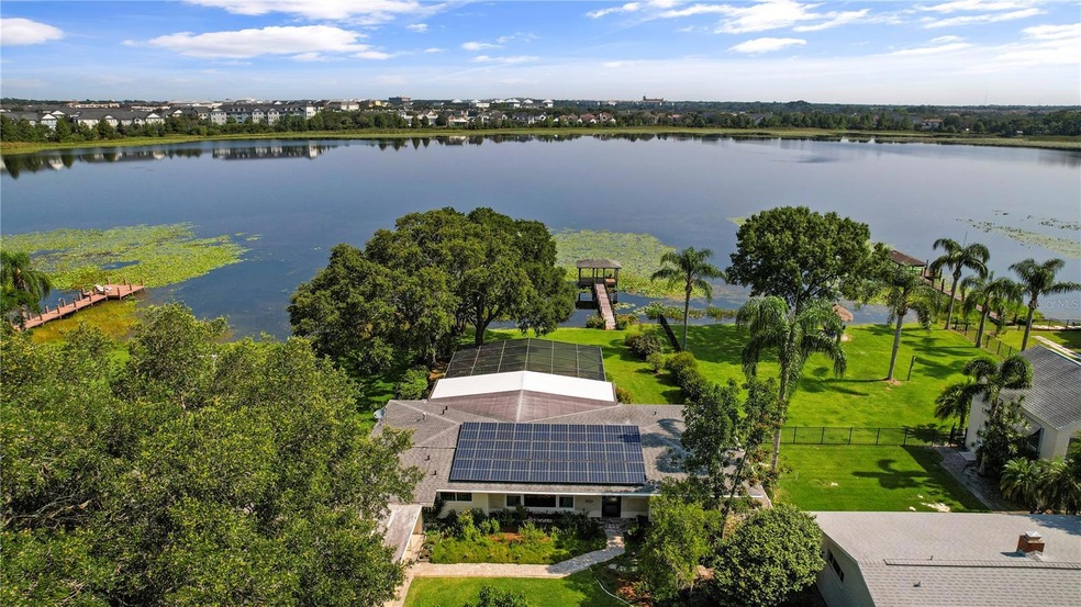 Welcome to your waterfront paradise! Nestled in a quiet, established community with **BREATHTAKING VIEWS OF LAKE SUSANNAH** this 4 bedroom, 3 bath home is located just a stone's throw away from **DOWNTOWN ORLANDO** and the vibrant **BALDWIN PARK** area for the perfect combination of tranquility and convenience!