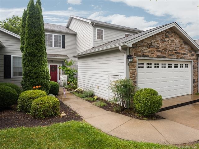 Two car garage on main level with a 3rd garage bel