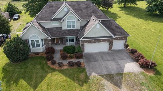 703 N Madison St, Raymore, MO 64083 - photo 1
