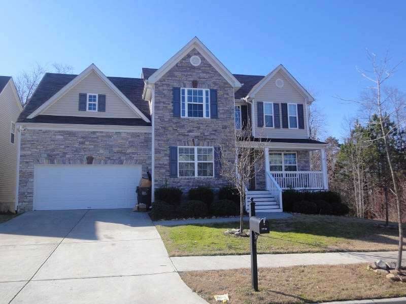 Exterior Front. Beautiful stacked stone on front o