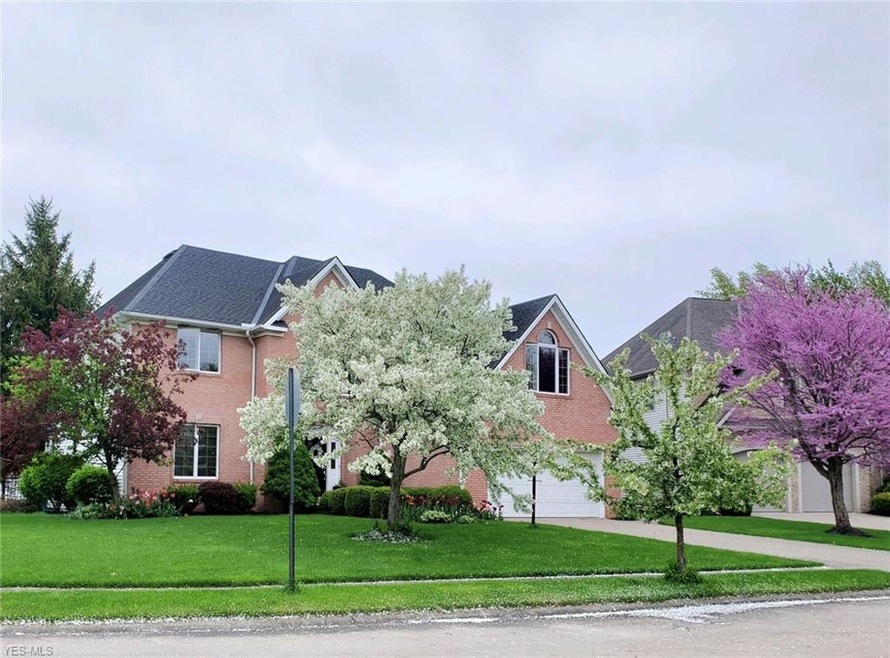 Gorgeous brick front colonial on corner lot!