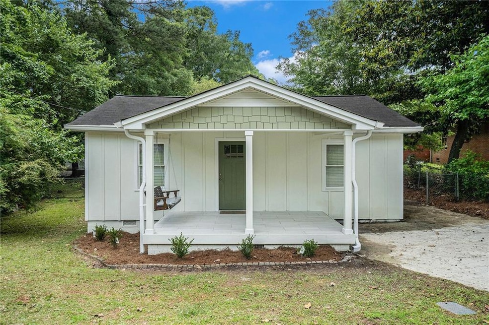 View of front facade featuring covered porch, a fr