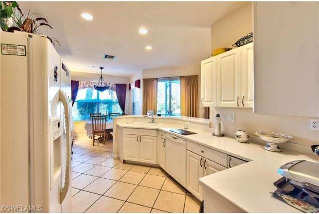 12854 Carrington Cir unit 103, Naples, FL 34105 - photo 1