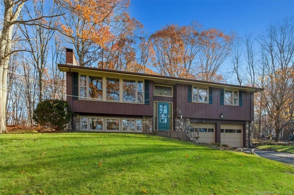 Lovely Setting for 1662 SF Raised Ranch.