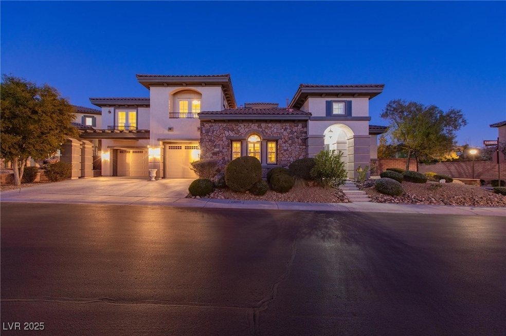 Mediterranean / spanish house with a garage, stone