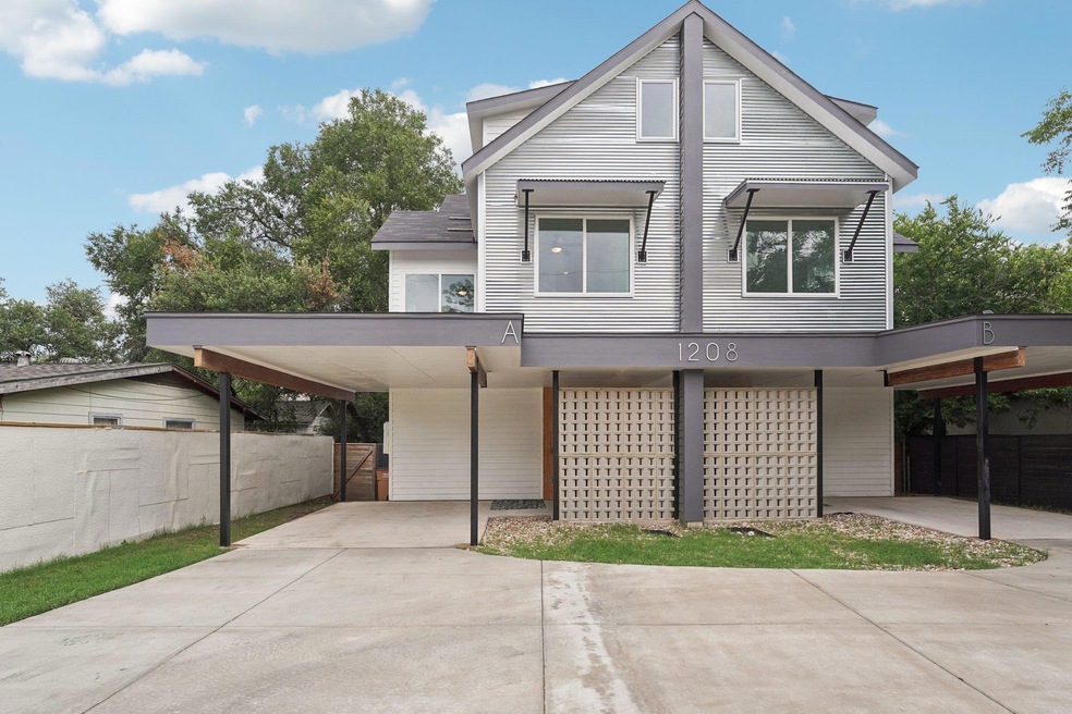 View of front of property with driveway