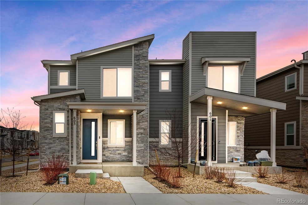 Welcome to your Contemporary Townhome on a Corner Lot that is sure to impress