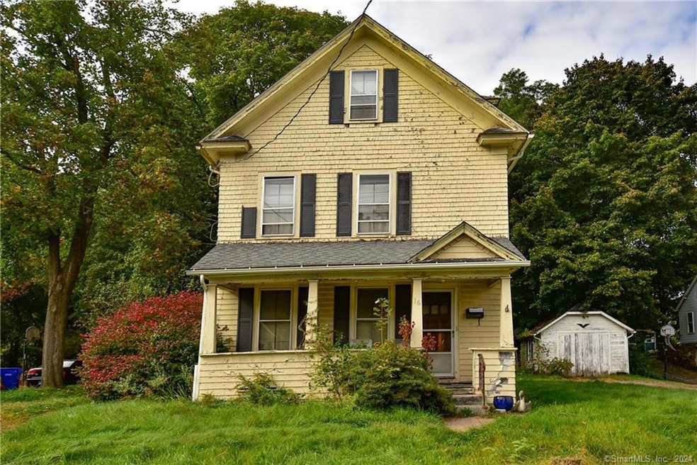 Front view of Property with covered porch entry.