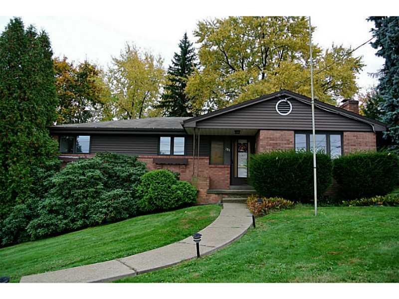 Exterior Front. Front of the house with flag pole.