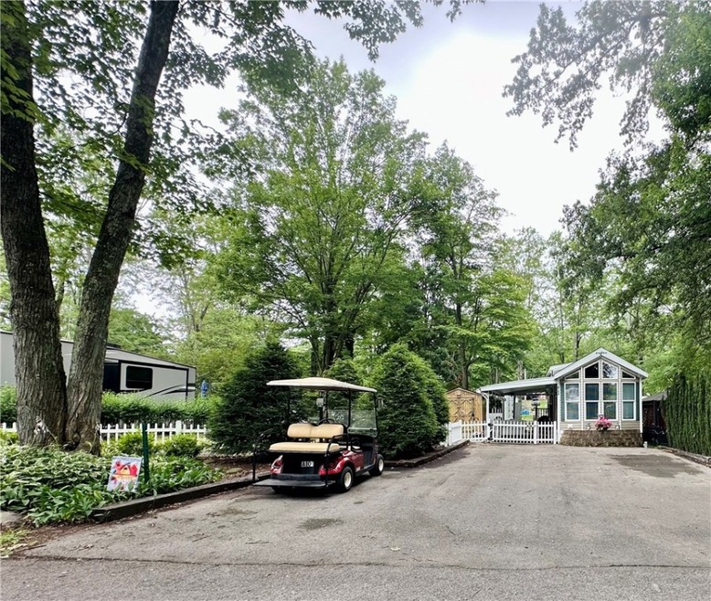 Front Exterior, level paved driveway.