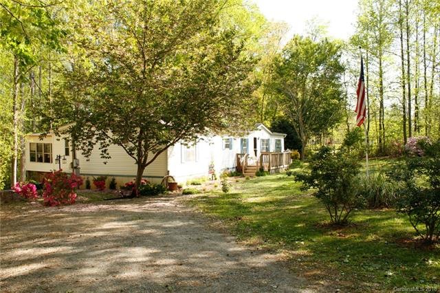 Gravel Driveway leading to the home in surrounded 