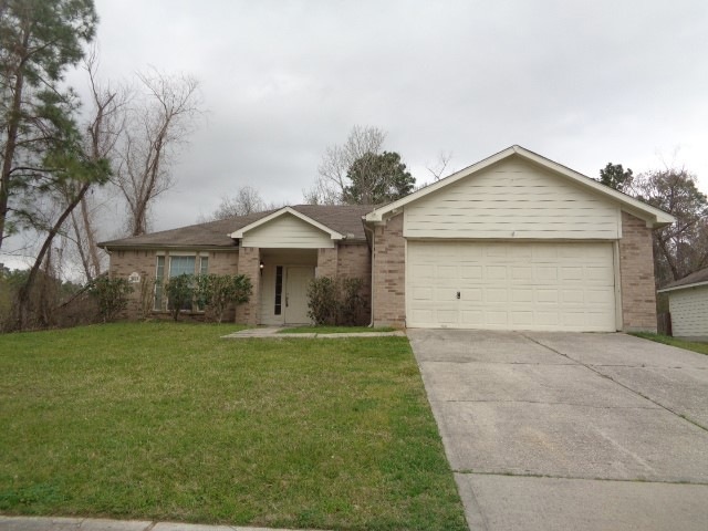 9803 Woodhollow Dr, Conroe, TX 77385 - photo 1