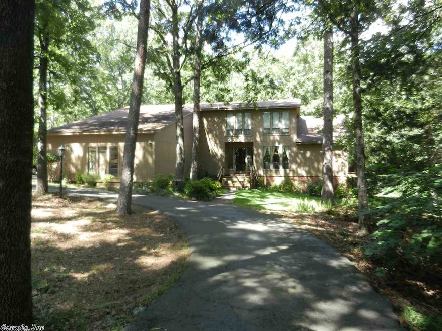 Secluded on over 3 acres, contemporary home shines