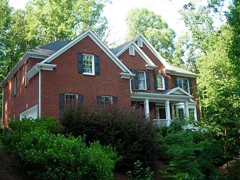 Exterior Front. Park like setting on 1 acre in des