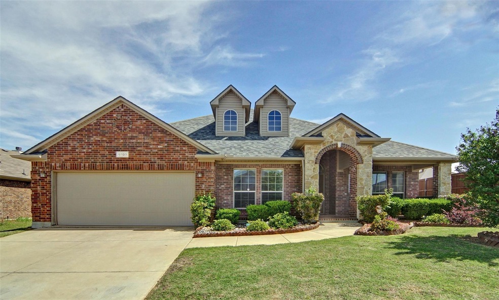 This home has excellent curb appeal. Brick and sto