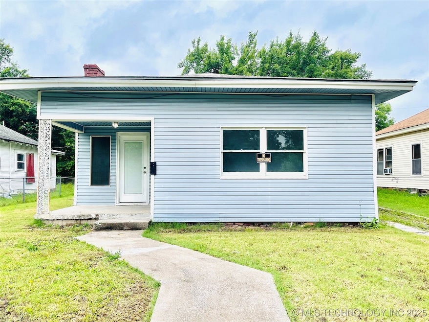 910 N Collins Ave, Okmulgee, OK 74447 - photo 1