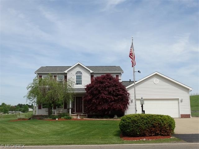 This four bedroom four full bath two story offers 