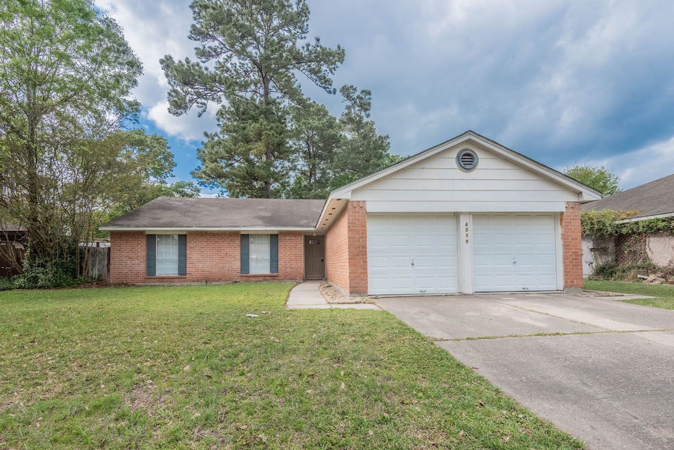6015 Knotty Post Ln, Spring, TX 77373 - photo 1