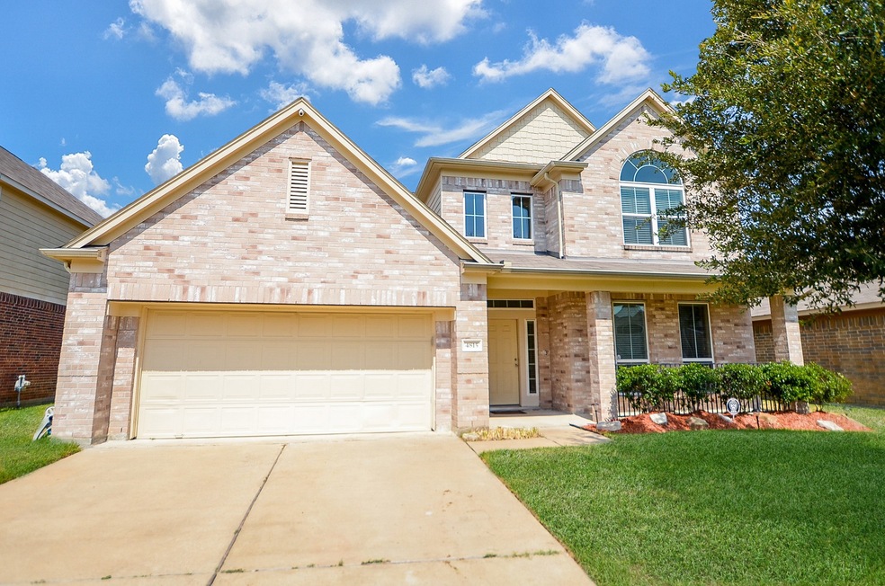 This beautiful home located in Ricewood Village ha