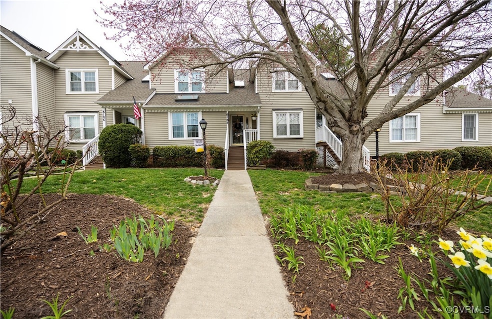 Welcome home to this beautifully landscaped front